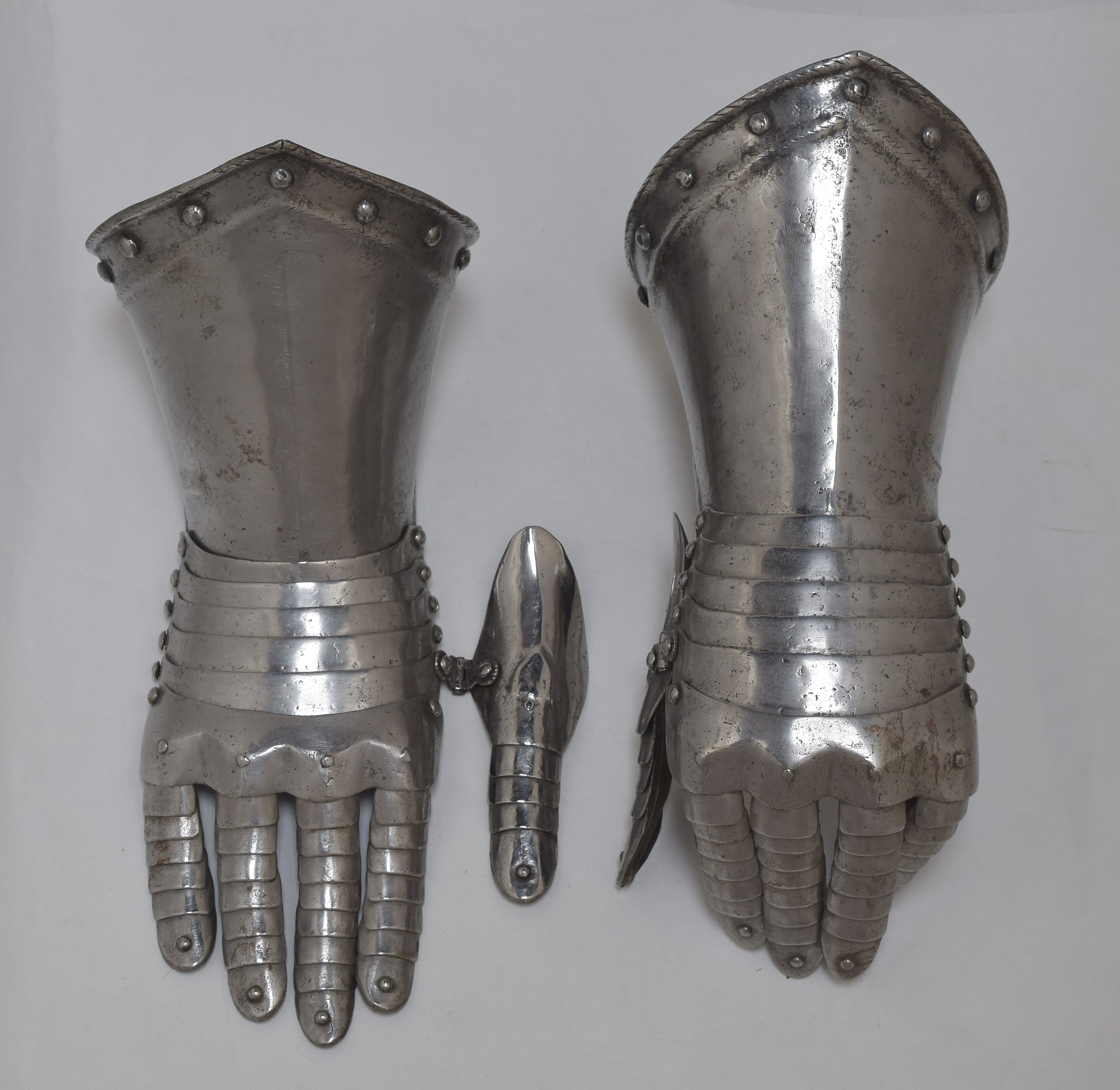 Pair of Gauntlets - A-160-white-one-propped-straight-down