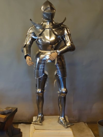 armor stand made of steel pipe and fittings.