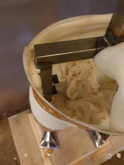 armor stand made of steel pipe and fittings.