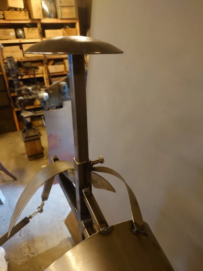 armor stand made of steel pipe and fittings.