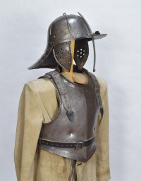 stand for a mid 16th c. black and white armor made for a child