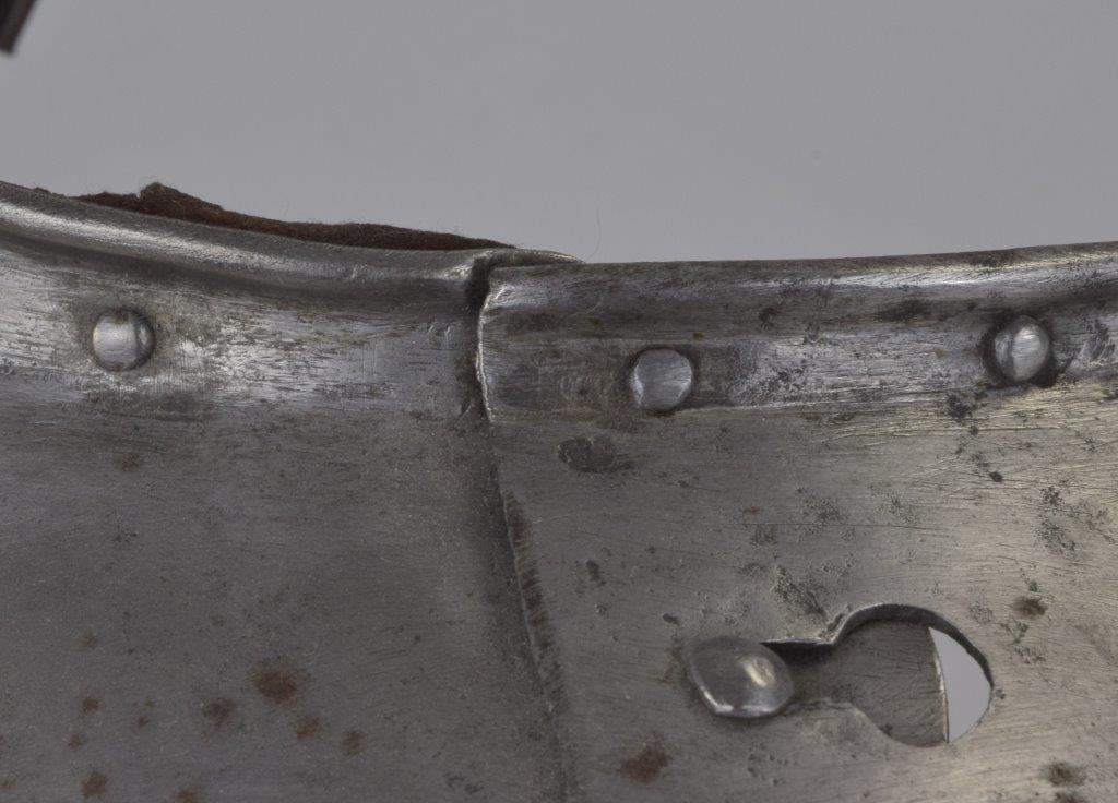 gorget details showing the uppper plate, roll, hinges and pins